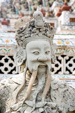 simsearch:400-03985821,k - Guardian statue at the Buddhist temple of Wat Arun in Bangkok, Thailand. Foto de stock - Super Valor sin royalties y Suscripción, Código: 400-05156445