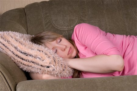 Sleeping pretty woman at sofa Stock Photo - Budget Royalty-Free & Subscription, Code: 400-05156800