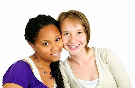 simsearch:614-02984866,k - Isolated portrait of two diverse teenage girl friends Stockbilder - Microstock & Abonnement, Bildnummer: 400-05157046