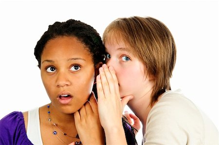 Isolated portrait of two diverse teenage girl friends gossiping Stock Photo - Budget Royalty-Free & Subscription, Code: 400-05157047