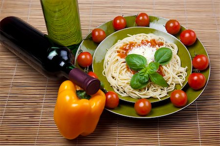 Pasta with tomato sauce basil and grated parmesan Stock Photo - Budget Royalty-Free & Subscription, Code: 400-05157070