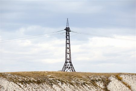 simsearch:400-09274553,k - High voltage line and electricity pylon on cretaceous mountains on a coastaline of the river Don. Russia. Stock Photo - Budget Royalty-Free & Subscription, Code: 400-05157227