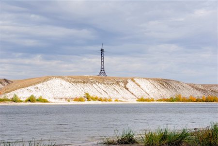 simsearch:400-09274553,k - High voltage line and electricity pylon on cretaceous mountains on a coastaline of the river Don. Russia. Stock Photo - Budget Royalty-Free & Subscription, Code: 400-05157229