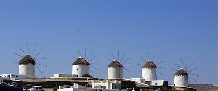 The row of the Lower Windmills in Mykonos Island, Greece Stock Photo - Budget Royalty-Free & Subscription, Code: 400-05157474