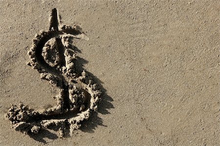 dollar sign in sand - American currency simbol, dollar sign written on the beach sand Stock Photo - Budget Royalty-Free & Subscription, Code: 400-05157833