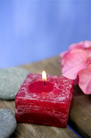 simsearch:400-04881211,k - Natural theraphy, stones, and candles over wood Stock Photo - Budget Royalty-Free & Subscription, Code: 400-05157846