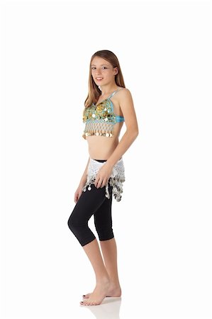 simsearch:400-04627234,k - Young Caucasian belly dancing girl in beautiful decorated clothes on white background and reflective floor. Not isolated Foto de stock - Super Valor sin royalties y Suscripción, Código: 400-05158789