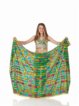 simsearch:859-03598912,k - Young Caucasian belly dancing girl in beautiful decorated clothes on white background and reflective floor. Not isolated Stock Photo - Budget Royalty-Free & Subscription, Code: 400-05158794