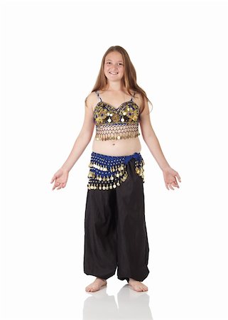 simsearch:400-05154700,k - Young Caucasian belly dancing girl in beautiful decorated clothes on white background and reflective floor. Not isolated Stock Photo - Budget Royalty-Free & Subscription, Code: 400-05158792