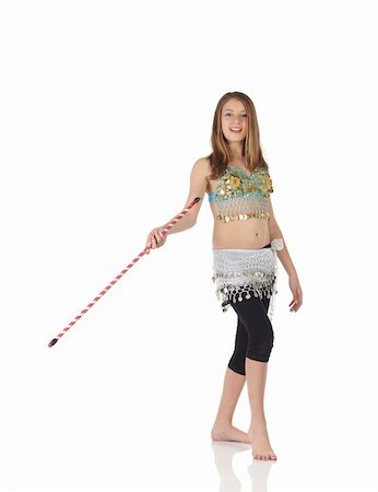 simsearch:400-04627234,k - Young Caucasian belly dancing girl in beautiful decorated clothes on white background and reflective floor. Not isolated Foto de stock - Super Valor sin royalties y Suscripción, Código: 400-05158857