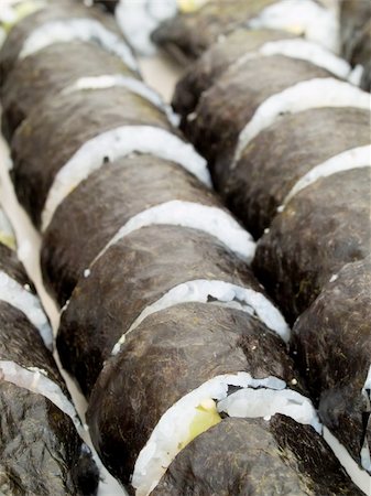 Rows of homemade maki sushi rolls Stock Photo - Budget Royalty-Free & Subscription, Code: 400-05158884