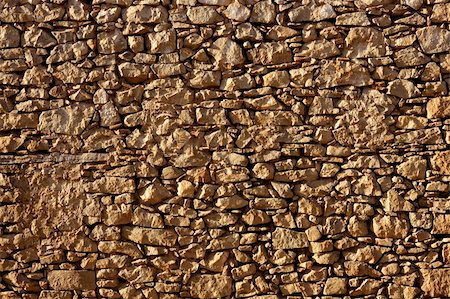 simsearch:400-04533137,k - Masonry stone wall texture, old Spain ancient architecture detail Foto de stock - Royalty-Free Super Valor e Assinatura, Número: 400-05159251