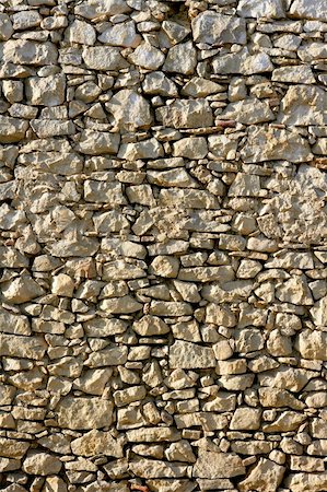 dirty city - Masonry stone wall texture, old Spain ancient architecture detail Stock Photo - Budget Royalty-Free & Subscription, Code: 400-05159252