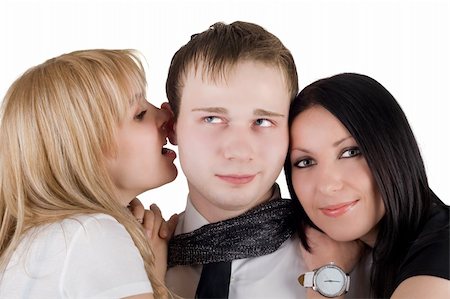 Portrait of the young man and two young women. Isolated Stock Photo - Budget Royalty-Free & Subscription, Code: 400-05159464