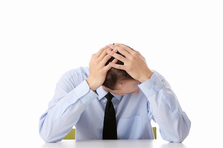 simsearch:400-05363701,k - Businessman in depression with hand on forehead, isolated over white Stock Photo - Budget Royalty-Free & Subscription, Code: 400-05159476