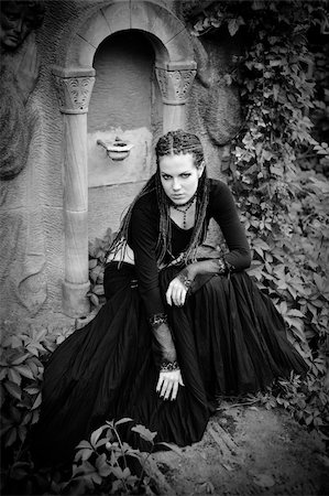 pretty girls with long dark hair - gothic girl at cemetery, black and white variant Stock Photo - Budget Royalty-Free & Subscription, Code: 400-05159501