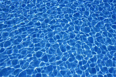 Blue water texture, tiles pool in sunny day with light reflections Stock Photo - Budget Royalty-Free & Subscription, Code: 400-05159514