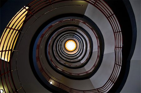 looking upwards in a beautiful old spiral staircase Foto de stock - Super Valor sin royalties y Suscripción, Código: 400-05159837