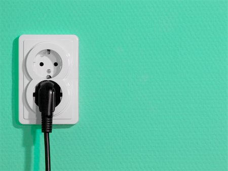 plug and socket white - White electric socket on green wall Stock Photo - Budget Royalty-Free & Subscription, Code: 400-05150200