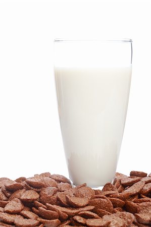 simsearch:400-04866989,k - A fresh milk tumbler and chocolate cornflakes on white background. Shallow depth of field Stockbilder - Microstock & Abonnement, Bildnummer: 400-05150382