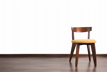 Chair is located in the empty room on the white background. Stock Photo - Budget Royalty-Free & Subscription, Code: 400-05150815