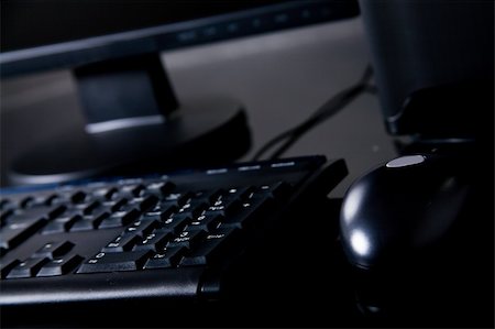 Black desktop computer on desk with mouse, keyboard and monitor Stock Photo - Budget Royalty-Free & Subscription, Code: 400-05151669