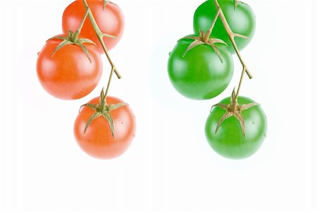 simsearch:400-07288793,k - Red and green tomatoes on the green branch. Photographie de stock - Aubaine LD & Abonnement, Code: 400-05152348