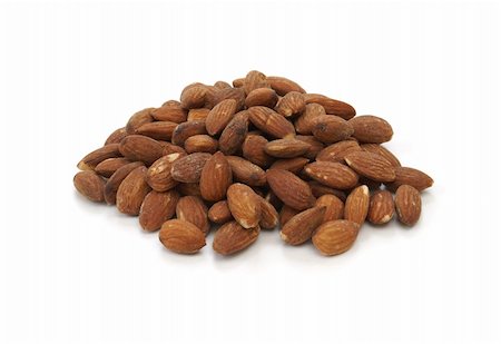 A pile of almonds isolated on white background. Stock Photo - Budget Royalty-Free & Subscription, Code: 400-05152425