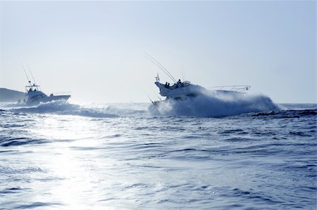 simsearch:400-07933424,k - Fishing boat in a big game summer blue morning in Mediterranean sea Foto de stock - Super Valor sin royalties y Suscripción, Código: 400-05152541