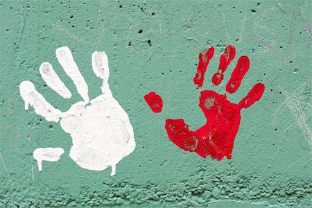 Hand prints with paint on concrete wall Stock Photo - Budget Royalty-Free & Subscription, Code: 400-05152695