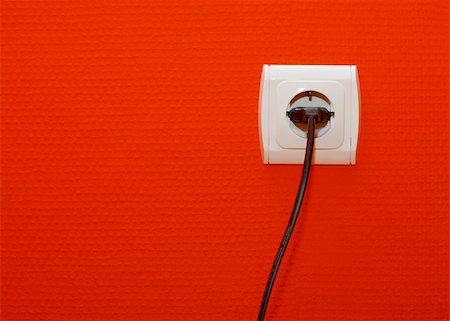 simsearch:400-04836001,k - Electric outlet on red wall with cable connected Stock Photo - Budget Royalty-Free & Subscription, Code: 400-05152699