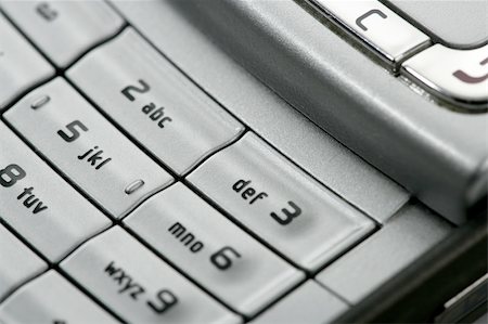 simsearch:400-03992117,k - Mobile phone macro keyboard detail, electronics closeup Stock Photo - Budget Royalty-Free & Subscription, Code: 400-05152764