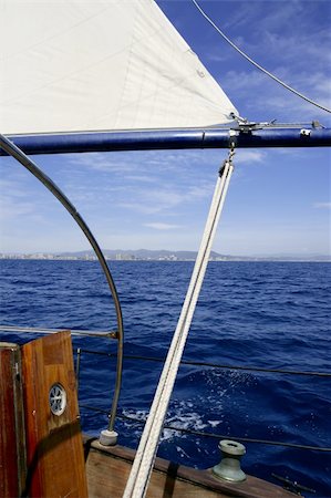 simsearch:400-06101259,k - Sailboat sailing blue sea on sunny summer day in Mediterranean Fotografie stock - Microstock e Abbonamento, Codice: 400-05152769