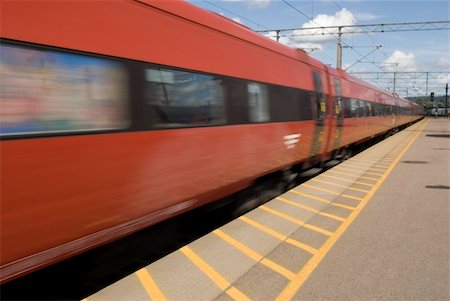 simsearch:400-04772077,k - The train moves on a rail way. Motion blur Photographie de stock - Aubaine LD & Abonnement, Code: 400-05153481