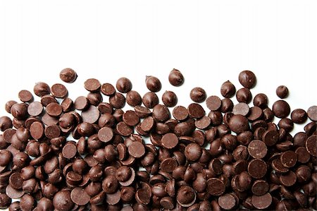 Chocolate Chips on White Background Stock Photo - Budget Royalty-Free & Subscription, Code: 400-05164339