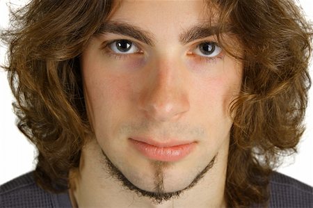 Portrait of an attractive young man against a white background. Stock Photo - Budget Royalty-Free & Subscription, Code: 400-05165304