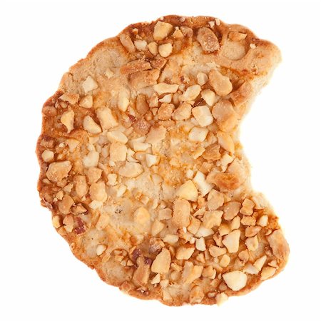 peanut cookie - Cookies with a nut crumb. Isolated over white Stock Photo - Budget Royalty-Free & Subscription, Code: 400-05166396