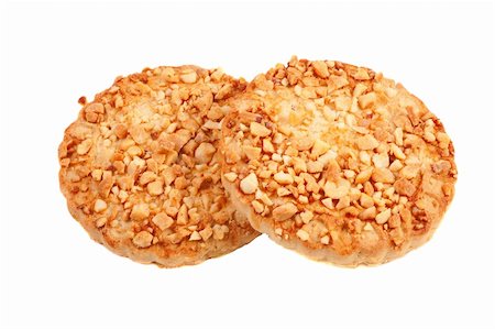peanut cookie - Cookies with a nut crumb. Isolated over white Stock Photo - Budget Royalty-Free & Subscription, Code: 400-05166391