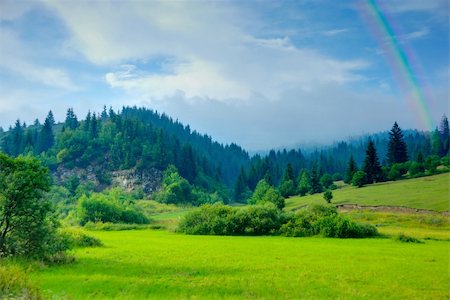 beautiful mountain landscape with rainbow right after rain Stock Photo - Budget Royalty-Free & Subscription, Code: 400-05166696