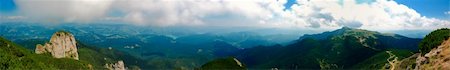Beautiful panorama from Ceahlau mountain, Romania.  At right appears Ceahlau church and Ocolasul Mare, a scientific reservation, restricted area.  In the middle is Izvorul muntelui lake. Stock Photo - Budget Royalty-Free & Subscription, Code: 400-05166700
