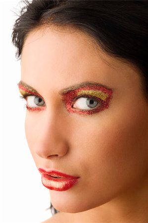 close up of a beautiful woman with artistic make-up on her face looking in camera Stock Photo - Budget Royalty-Free & Subscription, Code: 400-05166798