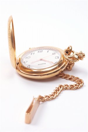 pocket watch - Golden pocket clock with chain Stock Photo - Budget Royalty-Free & Subscription, Code: 400-05166845