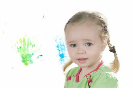 A little girl standing in studio Stock Photo - Budget Royalty-Free & Subscription, Code: 400-05166925