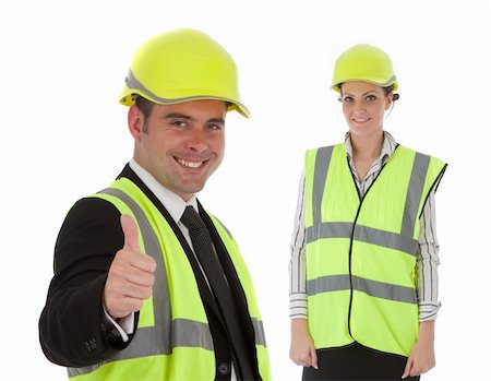 picture of old man construction worker - Two happy young engineers are smiling about some sort of achievement Stock Photo - Budget Royalty-Free & Subscription, Code: 400-05167076