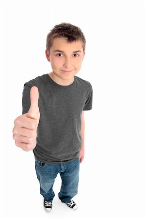 sign language kid - A pre teen boy with hand thumbs up sign. eg approval success, great.   On a white background, shadow left under feet. Foto de stock - Super Valor sin royalties y Suscripción, Código: 400-05167806