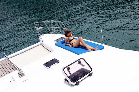 Attractive young woman on a yacht. Stock Photo - Budget Royalty-Free & Subscription, Code: 400-05168556