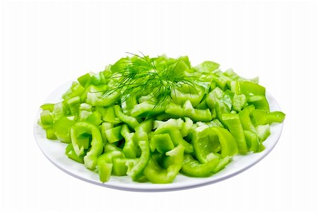 Green pepper on white plate isolated Stockbilder - Microstock & Abonnement, Bildnummer: 400-05168768