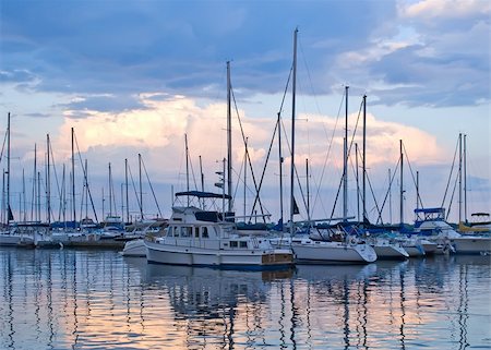 Boats and yachts moored in harbor at sunset Stockbilder - Microstock & Abonnement, Bildnummer: 400-05168760