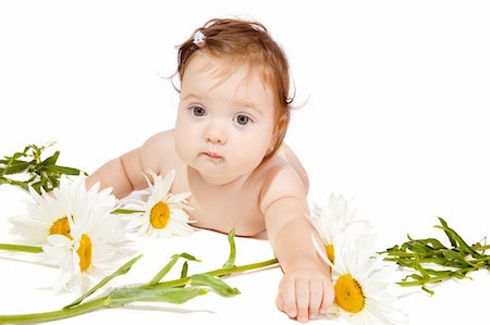 Cute chamomile baby girl, isolated, over white Stock Photo - Budget Royalty-Free & Subscription, Code: 400-05168823