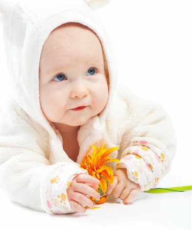 simsearch:400-05130009,k - Baby holding orange flower, isolated Stock Photo - Budget Royalty-Free & Subscription, Code: 400-05168855